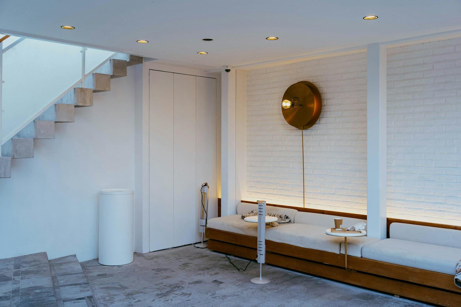 Modern interior fit-out with false ceiling and accent lighting by Tayyab Builders in Multan